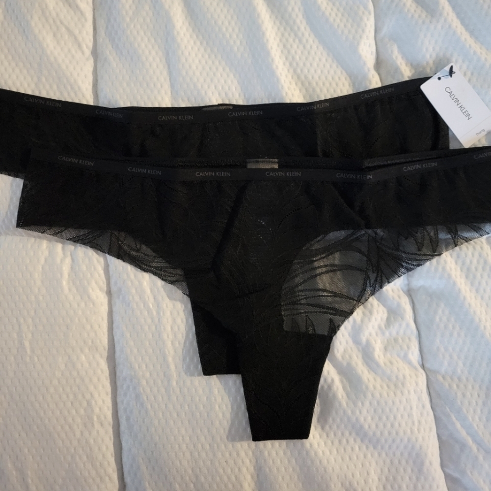 CALVIN KLEIN BRAND NEW SET OF TWO THONGS SIZE L